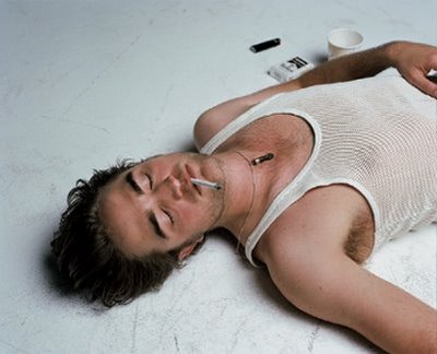 robert pattinson smoking photoshoot. Rob Pattinson smokes a little